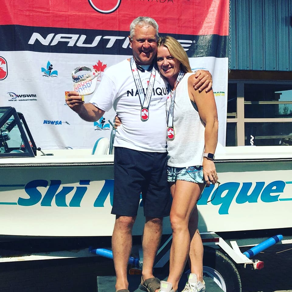 Ken and Kristy with championship medals