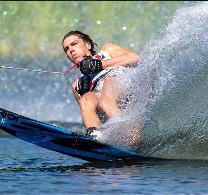 A person on water skis in the ocean.