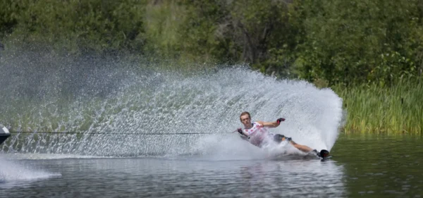 A man water skiing on the lake