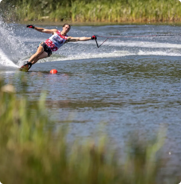 A person water skiing on the lake