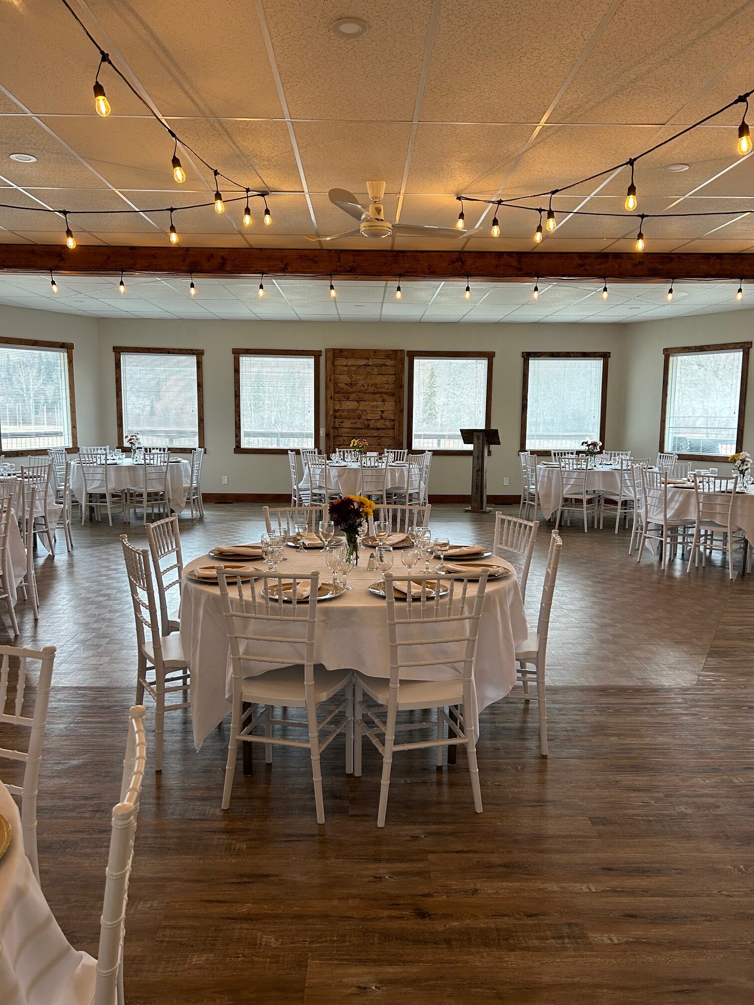 A large room with many tables and chairs