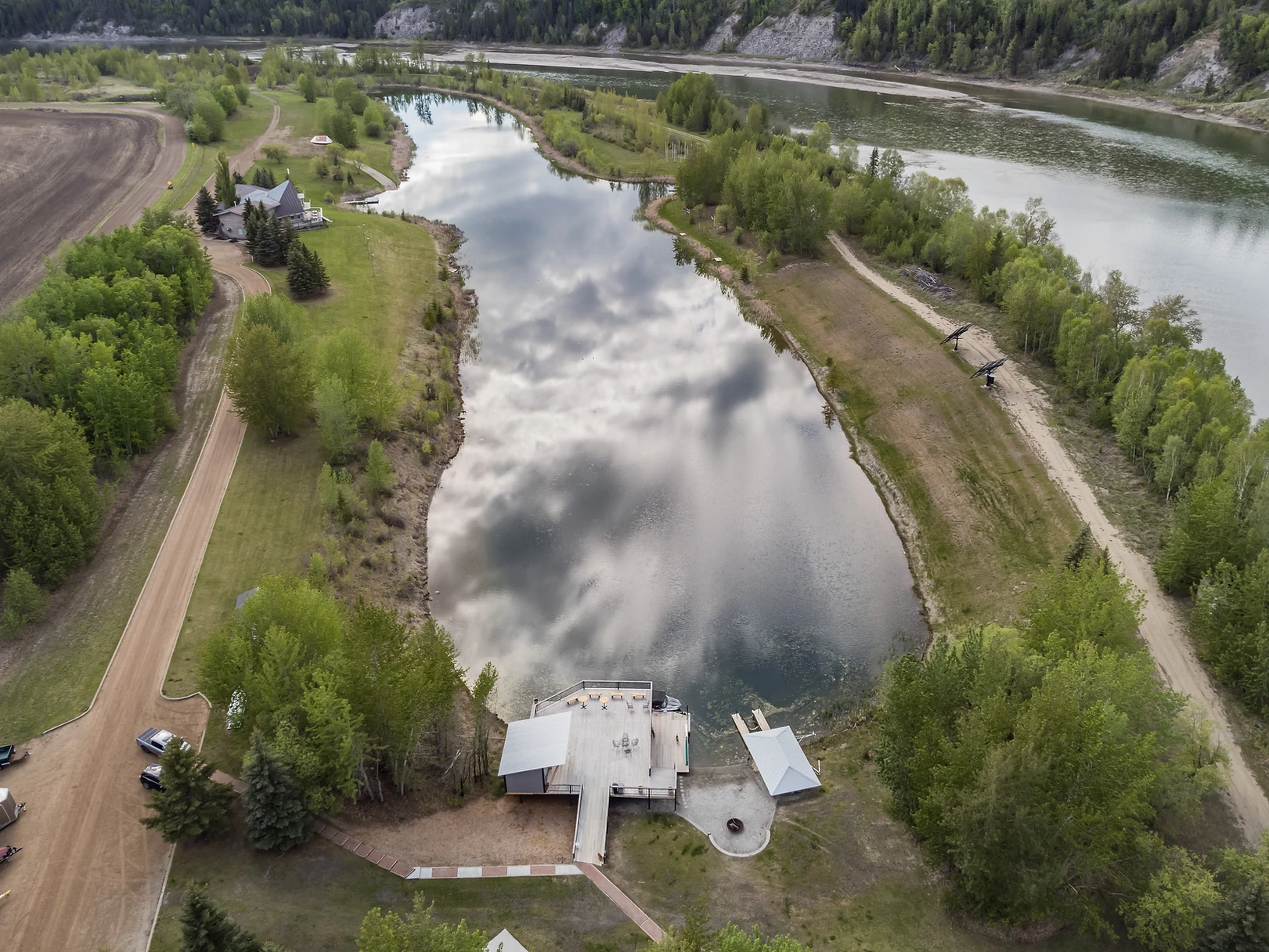 A body of water with trees around it