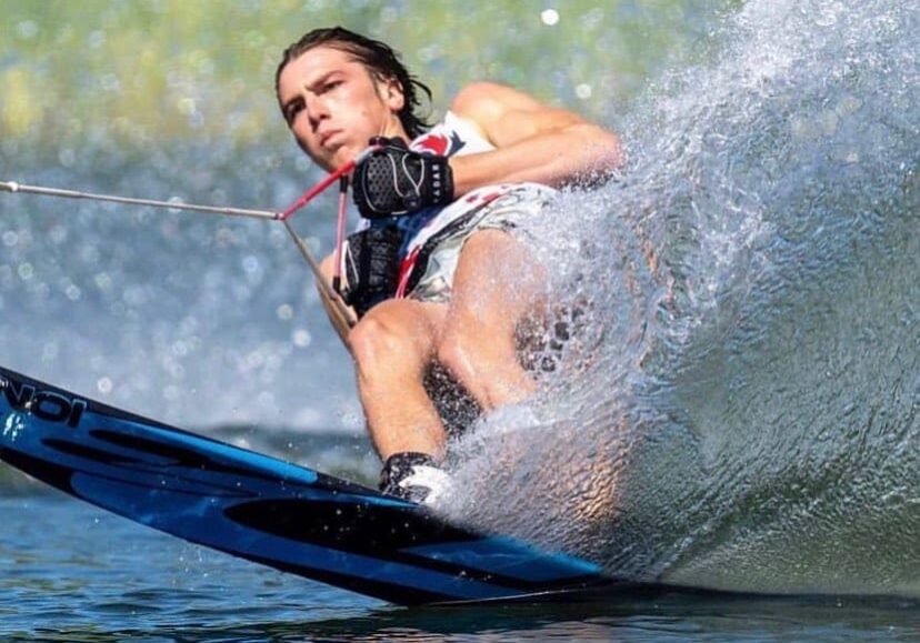 A person on water skis in the ocean.