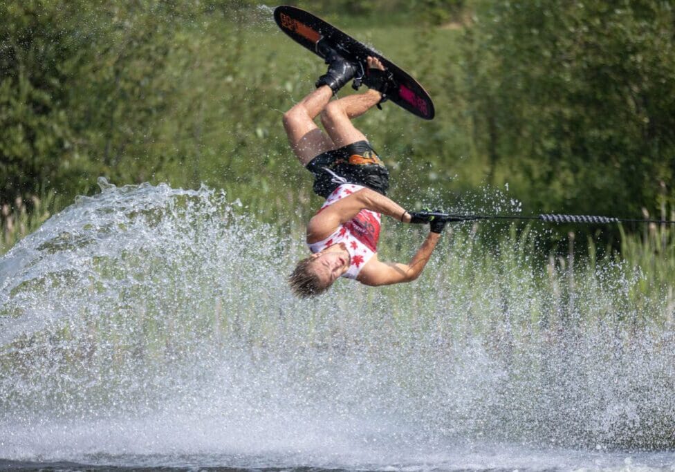 A person on water skis in the air.